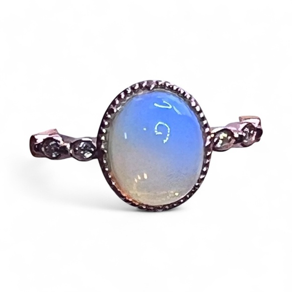 Beautiful gold color ring with bluish white opal looking stone. - Picture 3 of 8